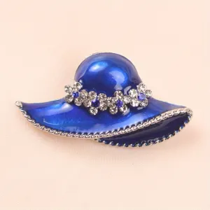 Macro view of an elegant blue sun hat brooch with sparkling crystal flower details
