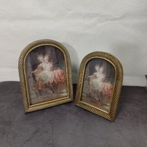 Vintage European arched gold resin photo frames with twisted rope borders in two sizes