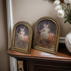 Vintage European gold arch photo frames with resin twisted rope border design detail view