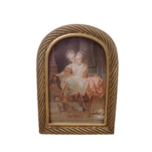 Vintage European style arched gold photo frame with decorative twisted rope border design