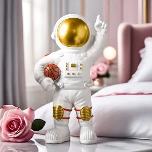 Creative astronaut figurine with basketball for modern home and office decor