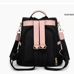 Stylish black and pink women's Oxford cloth backpack shown from the back for travel
