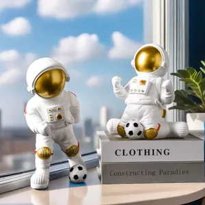 Detailed close-up of creative astronaut figurines with soccer balls on a modern bookshelf