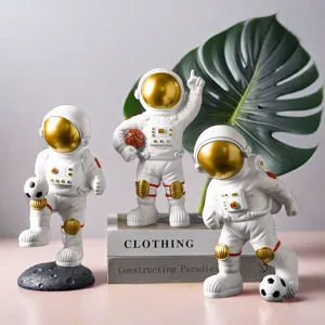 Set of three creative sport-themed astronaut sculptures for modern home office decor