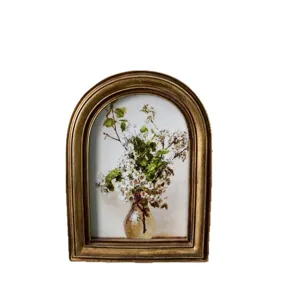 French vintage arched gold embossed picture frame with elegant floral oil painting artwork