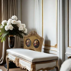Ornate gold French vintage photo frame displayed on a luxury white and gold bench
