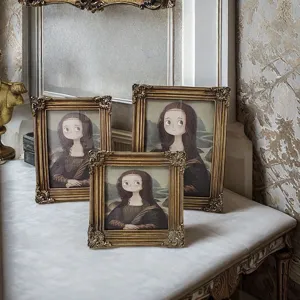 Ornate vintage gold resin frames with cartoon Mona Lisa art for elegant home decor