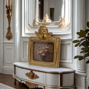Elegant French vintage golden cherub photo frame displayed on a classic marble sideboard