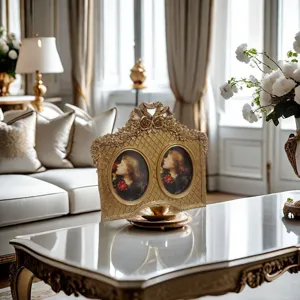 Detailed view of a vintage ornate gold French style double photo frame for home decoration.