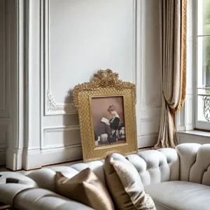 Luxury ornate French retro gold picture frame with classical art in a living room
