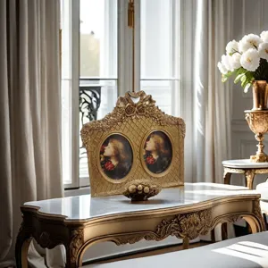 Detailed view of an ornate gold French vintage double photo frame in a luxury interior.