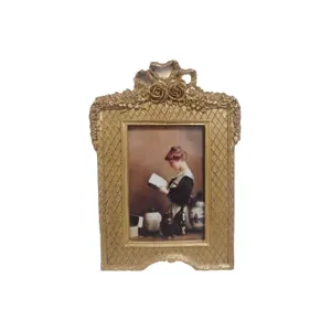 Vintage French gold carved photo frame with ornate rose detailing for home decor