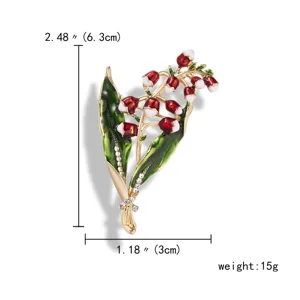 Detailed view of lily of the valley enamel brooch with size and weight specifications