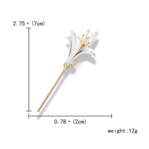 Detailed view of white lily enamel brooch with size and weight measurements