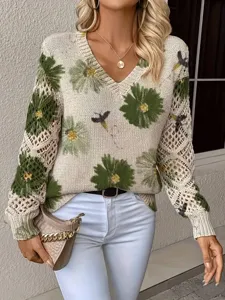 Elegant bohemian V-neck knit sweater with green floral prints and crochet sleeves.