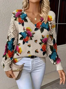Detailed view of bohemian floral print knit sweater with V-neck and hollow-out sleeves