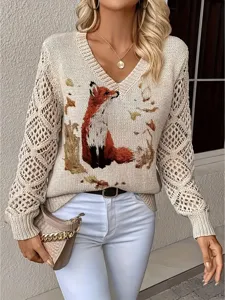 Detail of elegant V-neck sweater featuring fox print and hollow-out crochet sleeves.