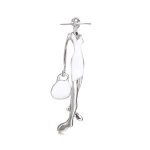 Elegant fashion lady brooch with white enamel detail and silver finish design