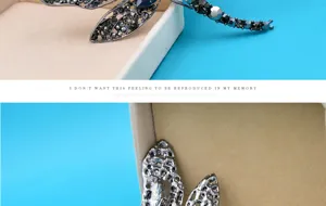 Detail of a retro large dragonfly brooch with sparkling rhinestones and vintage finish