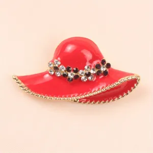 Elegant red sun hat brooch featuring sparkling rhinestones and gold-tone trim details