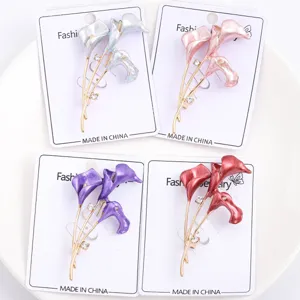 Set of four elegant enamel calla lily brooches in various vibrant colors
