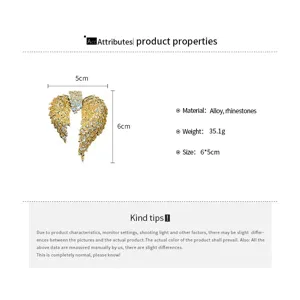 Detailed product attributes of a rhinestone angel wing brooch showing dimensions and weight.