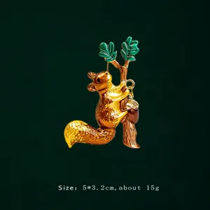 Macro view of creative squirrel brooch featuring green enamel leaves and acorn