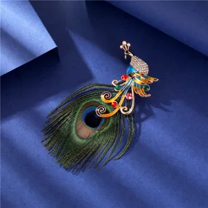 Exquisite detail of luxurious peacock brooch featuring real feather and colorful crystals