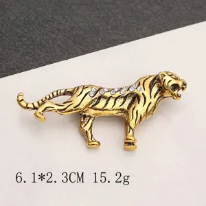 Vintage gold tiger brooch detail with dimensions 6.1x2.3cm and rhinestones.