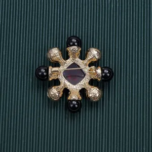 Detailed back view of vintage Baroque court style gold brooch pin with safety clasp