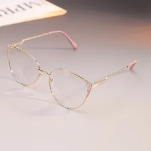 Elegantes gafas de ojo de gato en metal dorado con strass y lentes fotocromáticas