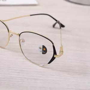 Detail shot of vintage style metal glasses frame with 2-in-1 photochromic lenses