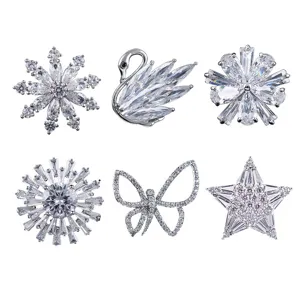 Elegante juego de broches de cisne y mariposa de cristal con microincrustaciones de circonio.