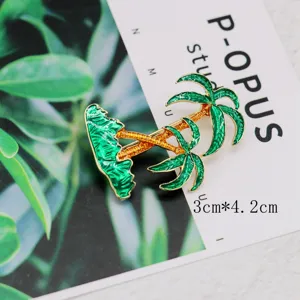 Close-up detail of vintage green enamel coconut tree brooch with 3cm*4.2cm size