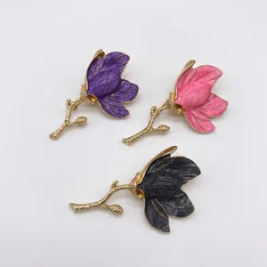 Elegant vintage tulip enamel brooches available in purple, pink, and grey palace style