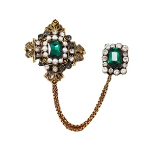 Vintage emerald green rhinestone brooch with gold-tone tassel chain for men's suits