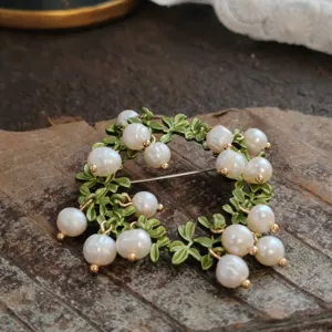 Vintage lily of the valley wreath brooch with green enamel leaves and white pearl pendants