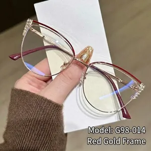 Eleganti occhiali anti luce blu gatto con montatura in metallo rosso oro e strass