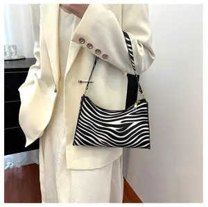 Elegant black and white zebra print underarm shoulder bag for women in vintage style