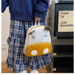 Süßer Kuh-Cartoon-Rucksack für Kinder mit verspieltem Tiergesichtsdesign für die Schule.