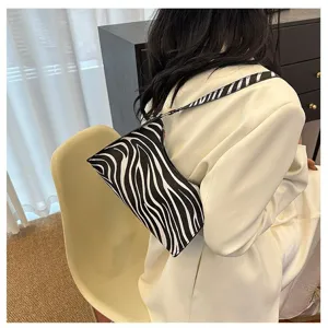 Stylish zebra print underarm bag for women, retro shoulder bag for daily commute.