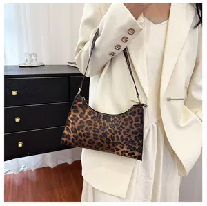 Chic leopard print underarm bag for women, retro baguette style shoulder bag with zipper.