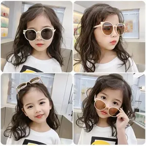 Cute cat-ear round sunglasses for girls with UV400 protection in trendy cream color