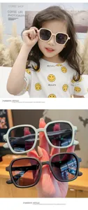 Stylische quadratische Kindersonnenbrille mit UV-Schutz, am Modell und im Detail gezeigt.