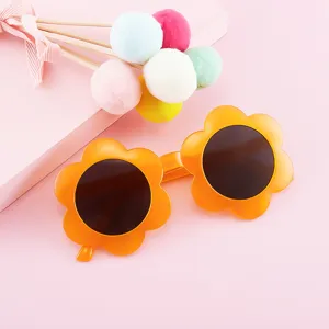 Vibrant orange flower-shaped sunglasses for kids aged 1-8 years old