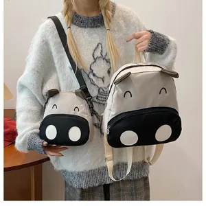 Süßes Kuh-Cartoon-Rucksack- und Umhängetaschen-Set für Kinder und Schüler in Weiß
