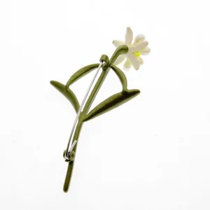 Back view of elegant green enameled carnation flower brooch showing silver pin clasp