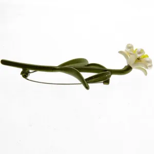 Vintage style green lacquered flower brooch accessory with elegant pearls and white petals