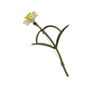 Vintage green enamel carnation brooch with pearl detail for women's elegant suits.