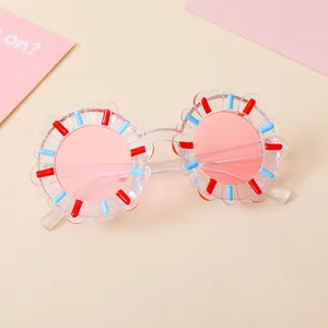 Trendy sunflower shaped kids sunglasses featuring UV protection and colorful frame accents